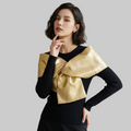 Elegant Black Ribbed Knit Top with Metallic Gold Bow Detail