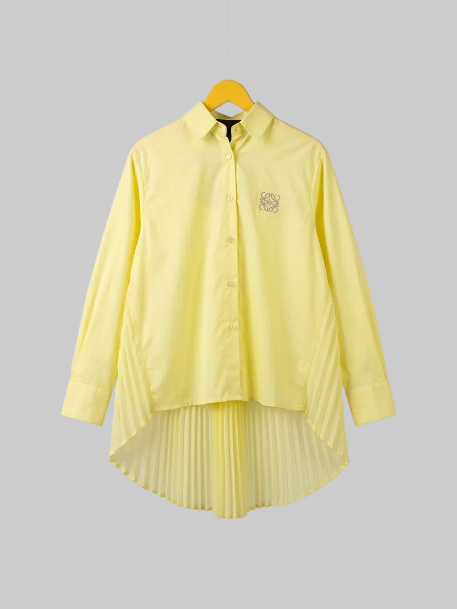 The Sculptural Pleated Blouse